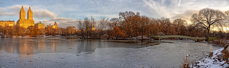 Bow bridge in winter after light snow