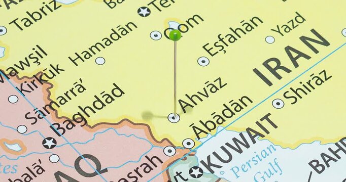 A zoom out of a green pin into Ahvaz city of Iran political map
