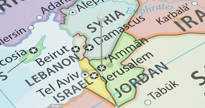 A zoom out of a white pin into Amman city of Hashemite Kingdom of Jordan political map