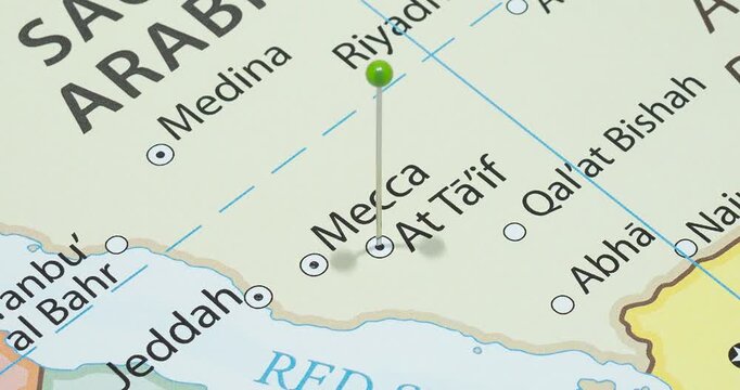 A zoom out of a green pin into At taif city of Kingdom of Saudi Arabia political map