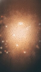 rain drops on window with blurred city lights