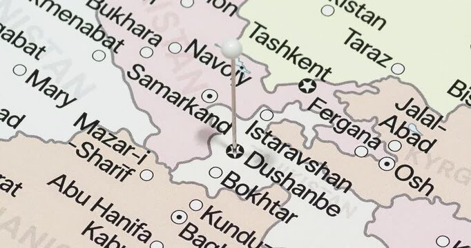 A zoom out of a white pin into dushanbe city of tajikistan political map