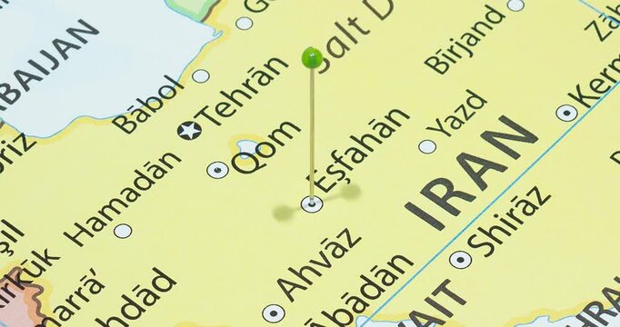 A zoom out of a green pin into Isfahan city of Iran political map