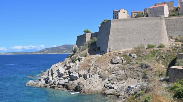 Coastal View of an Old Calvi Fortress by the Sea in Corsica, France