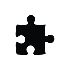 Obraz premium A single black puzzle piece shown in isolation emphasizing its shape a bold silhouette