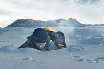 Digital composition of winter hiker stuck in deep snow
