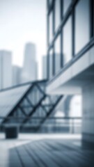 Fototapeta premium Blurry modern office building with cityscape background