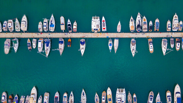 Top-down view of a marina with boats and docks