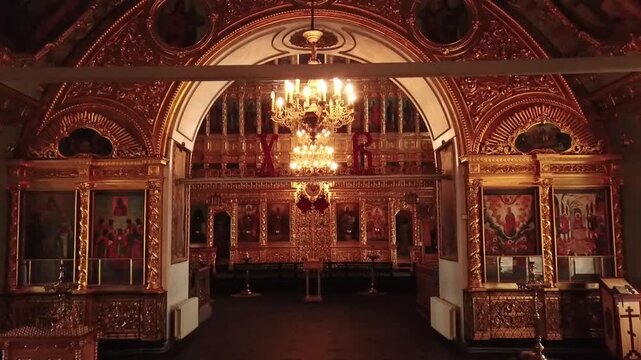 Backward drone movement inside orthodox cathedral interior