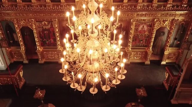 Smooth drone descent inside orthodox cathedral interior