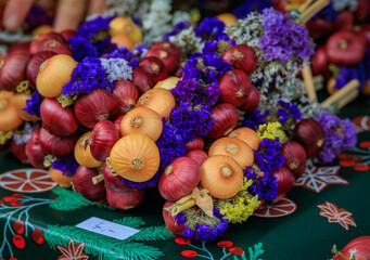 Braided onions with flowers for Zibelemarit festival in Bremgarten, Switzerland