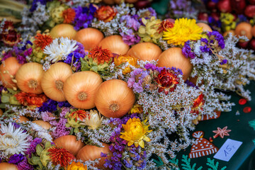 Braided onions with flowers for Zibelemarit festival in Bremgarten, Switzerland