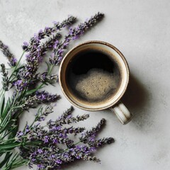 Dark coffee in mug with lavender sprigs, soft, neutral background