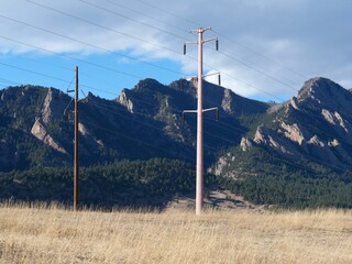 Power Lines and Utility Poles Crossing Grassland with the Flatirons in the Background, Boulder, Colorado © Ted Iwabuchi Nature