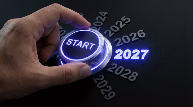 Hand Turning Knob to Start 2027 Year Concept on Dark Background - Powered by Adobe