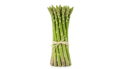 Fototapeta premium Fresh green asparagus bundle against white background.