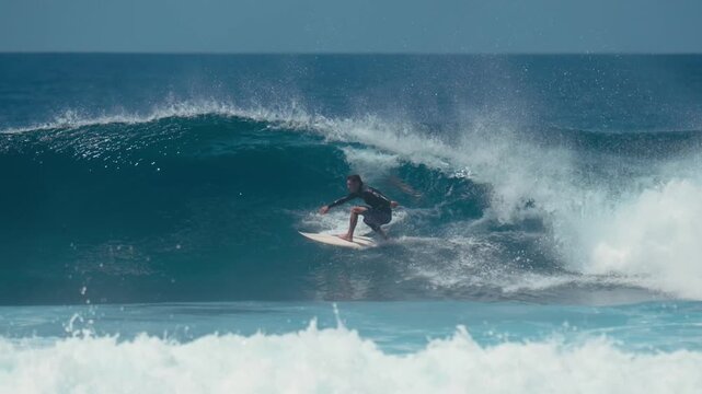 Surfer Dropping Into Heavy Reef Break Wave, Deep Bottom Turn And Explosive Whitewater, Dramatic Coastline, Raw