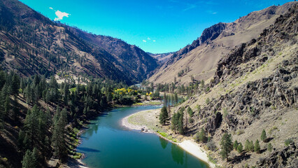 drone photo of Salmon River Canyon above Riggins, ID with beach and bluffs