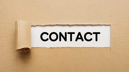 Word CONTACT revealed behind a torn section of brown paper for communication and support theme