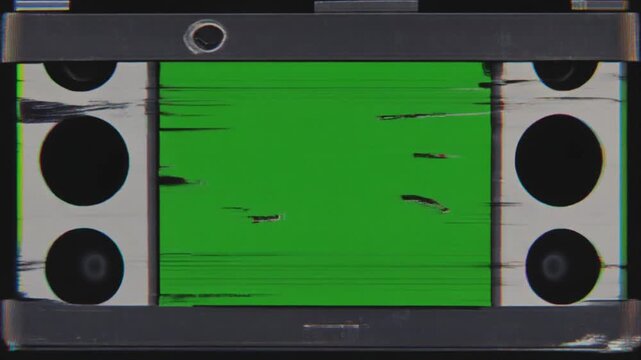 Old VHS tape tearing, glitching, static lines, rumble distortion, green screen center frame 4k video