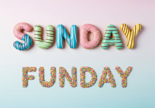 Colorful donuts arranged to spell Sunday with Funday written in sprinkles - Time Quality Concept