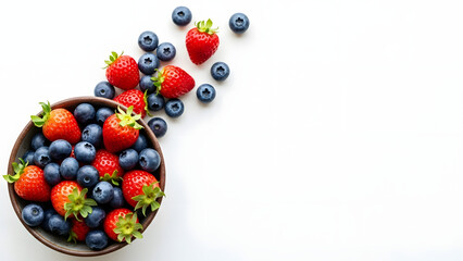 Fresh Strawberries and Blueberries in a Bowl on White Background