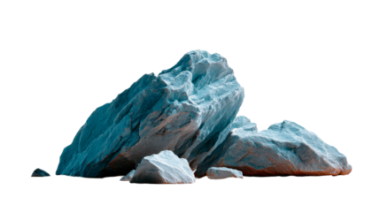 Large raw bluegreen geological rock formations with textured surfaces resting on a light ground offer a stark natural landscape for product presentations and background displays