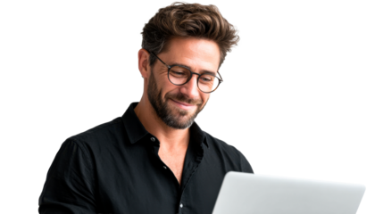 Confident man with glasses and a beard smiling while looking at his laptop, perfect for modern business, technology, or lifestyle marketing materials.