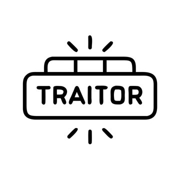 Neon sign. Word traitor against brick wall. Night view
