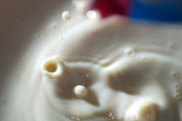 Strawberry milk in white color.