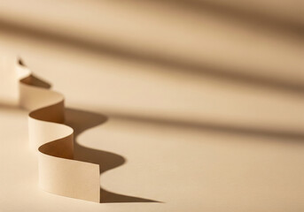 Textured curled paper element casting long, artistic shadows on a muted, minimalist background