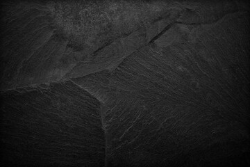 Dark grey black slate background or texture. black stone