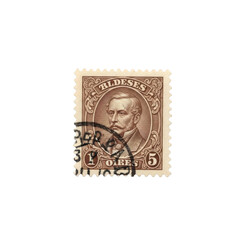 Obraz premium Vintage postage stamp with portrait of man and ornate design