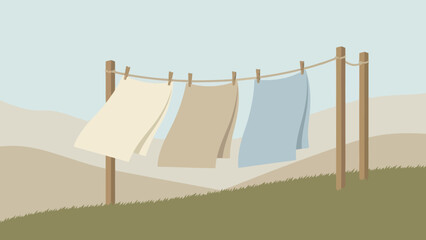Colorful Clothes Drying on a Clothesline in a Sunny Yard.