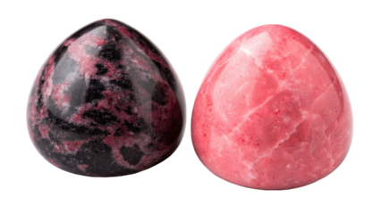 Two polished pink and black rhodochrosite gemstones on black background
