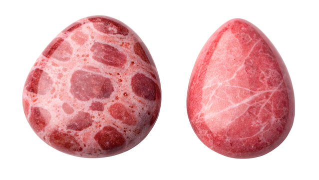 Two polished pink agate gemstones on black background