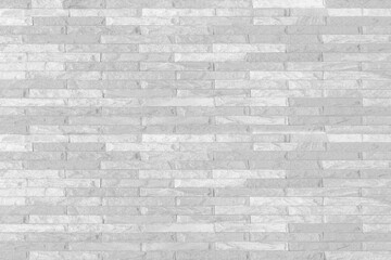 Fototapeta premium Surface white wall of stone wall gray tones for use as background.