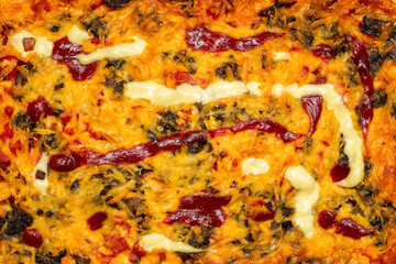 Texture of homemade pizza close-up. The surface of a fresh, delicious pizza