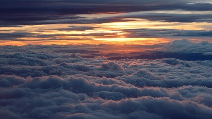 tranquil mountain sunrise above clouds, natural light, no people 