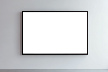 A sleek black framed blank canvas hangs on a white wall, perfect for art, advertisement, or interior design presentation