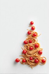 Spaghetti christmas tree with cherry tomatoes creating holiday food art, vertical
