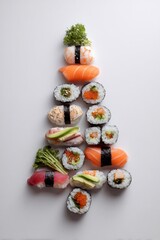 Sushi nigiri maki arranged as a christmas tree, vertical