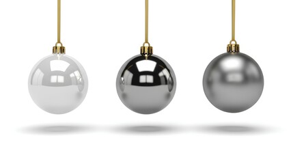 Three Christmas ornaments hanging from above against a white background
