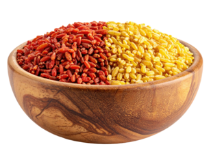 Wooden bowl halved, filled with bright red and yellow grains