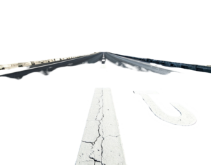 A perspective shot of a road with lane markings and a white curved arrow