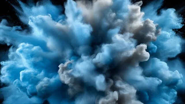 Dynamic blue smoke explosion against a black background for creative projects and designs