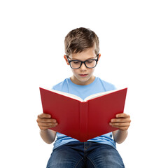 Young boy wearing glasses reading a red book