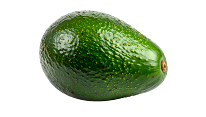 A fresh, ripe avocado with bumpy green skin, isolated on a black background