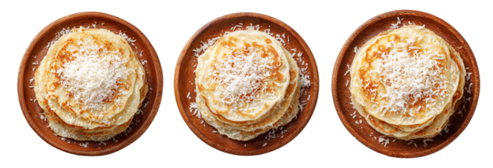 Set of Coconut pancakes stacked with coconut flakes and syrup on wooden plate, on white background, Fijian Takeaway Street Foods