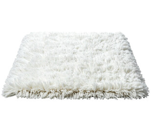 Fluffy white rectangular rug isolated on a dark background